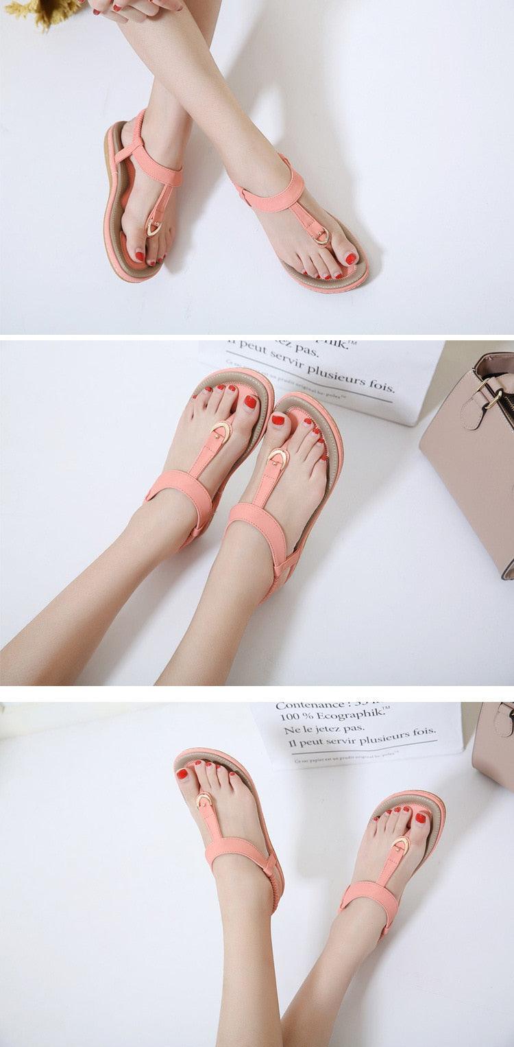Stevvex women's flat heel summer sandals with T-strap, elastic straps, soft sole, casual flip flops, beach shoes, and ankle design.