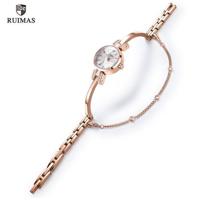 Stevvex luxury small silver women’s bracelet wristwatch with round face, quartz movement, waterproof, modern design.