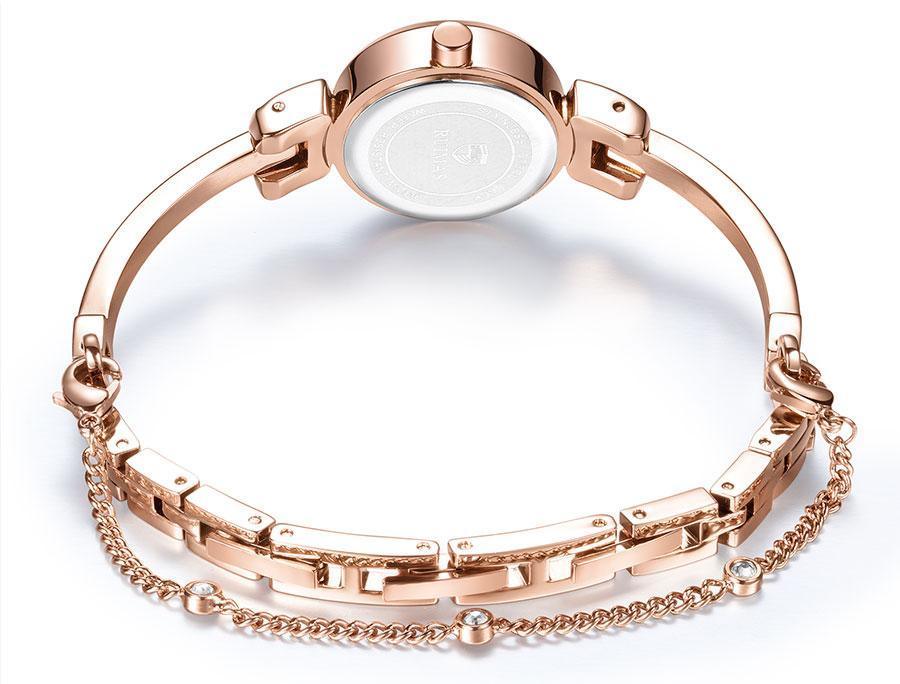 Small silver women's wristwatch by Stevvex with a modern bracelet design, round face, quartz movement, and waterproof features.