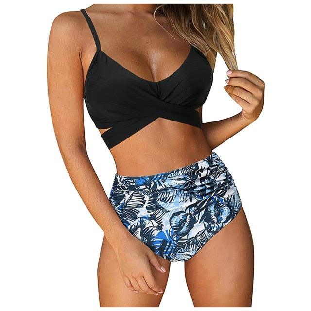Stevvex modern floral two-piece bikini set featuring high waist, crisscross design, flower print, and matching swim shorts for women.
