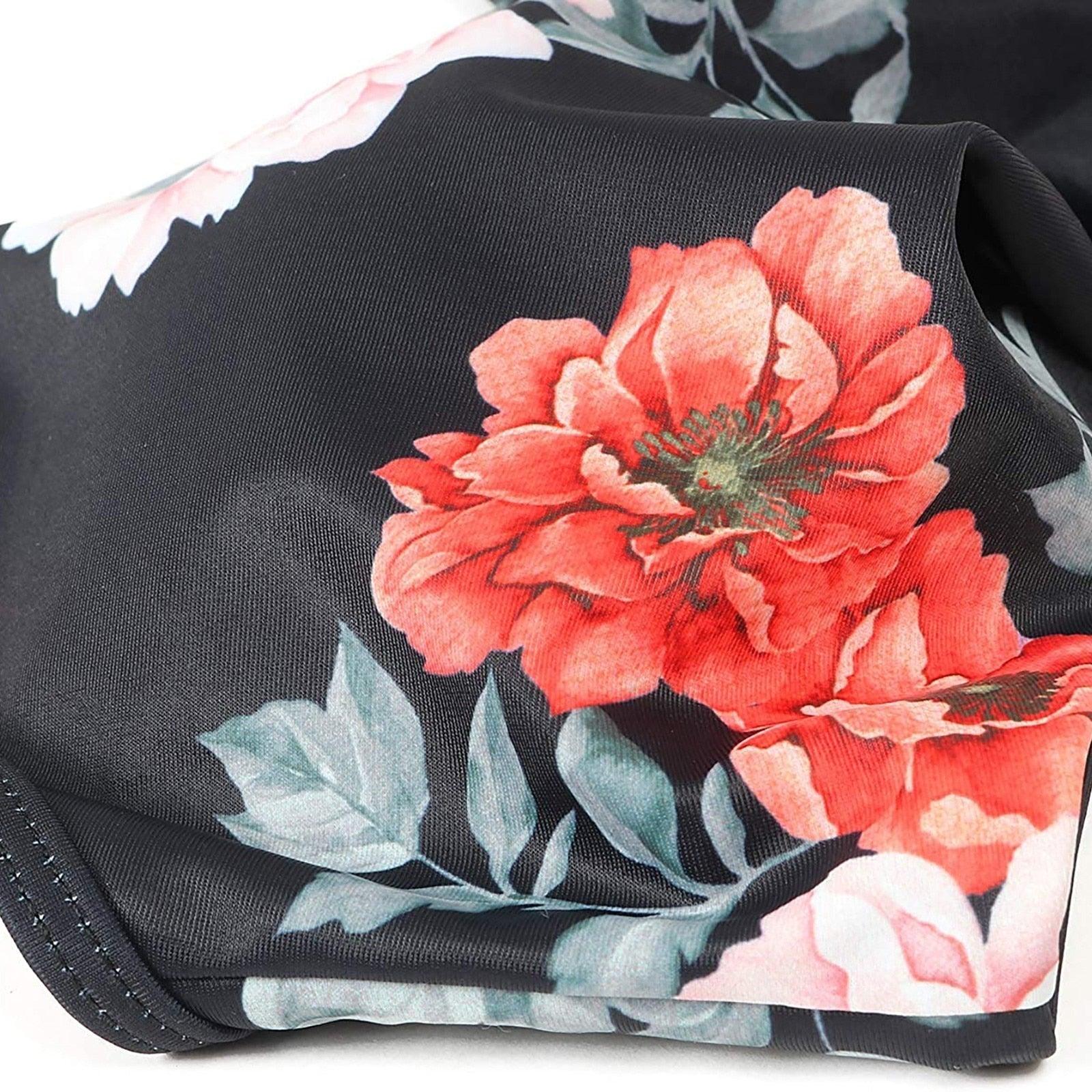 Stevvex modern floral bikini set with crisscross high waist design, flower print, and matching bikini shorts for women.