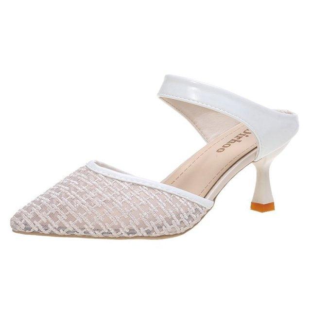 Stevvex Queen Fashion PU high heel sandals for women, transparent pointed toe design, stylish outdoor dress shoes with cross strap details.