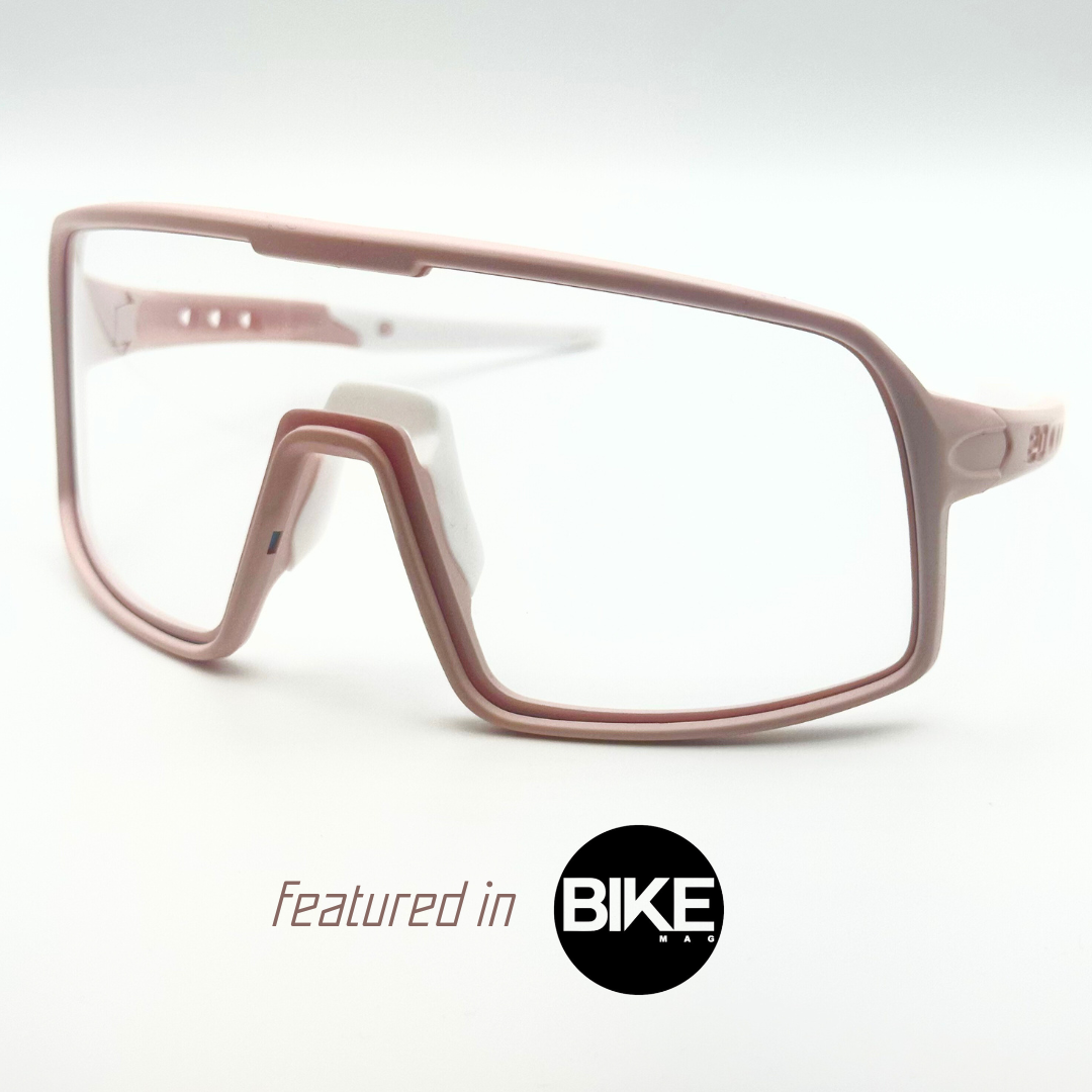 Eastern Outer Mojave sunglasses with photochromic lenses, rose-tinted frame, shown from a left angle.