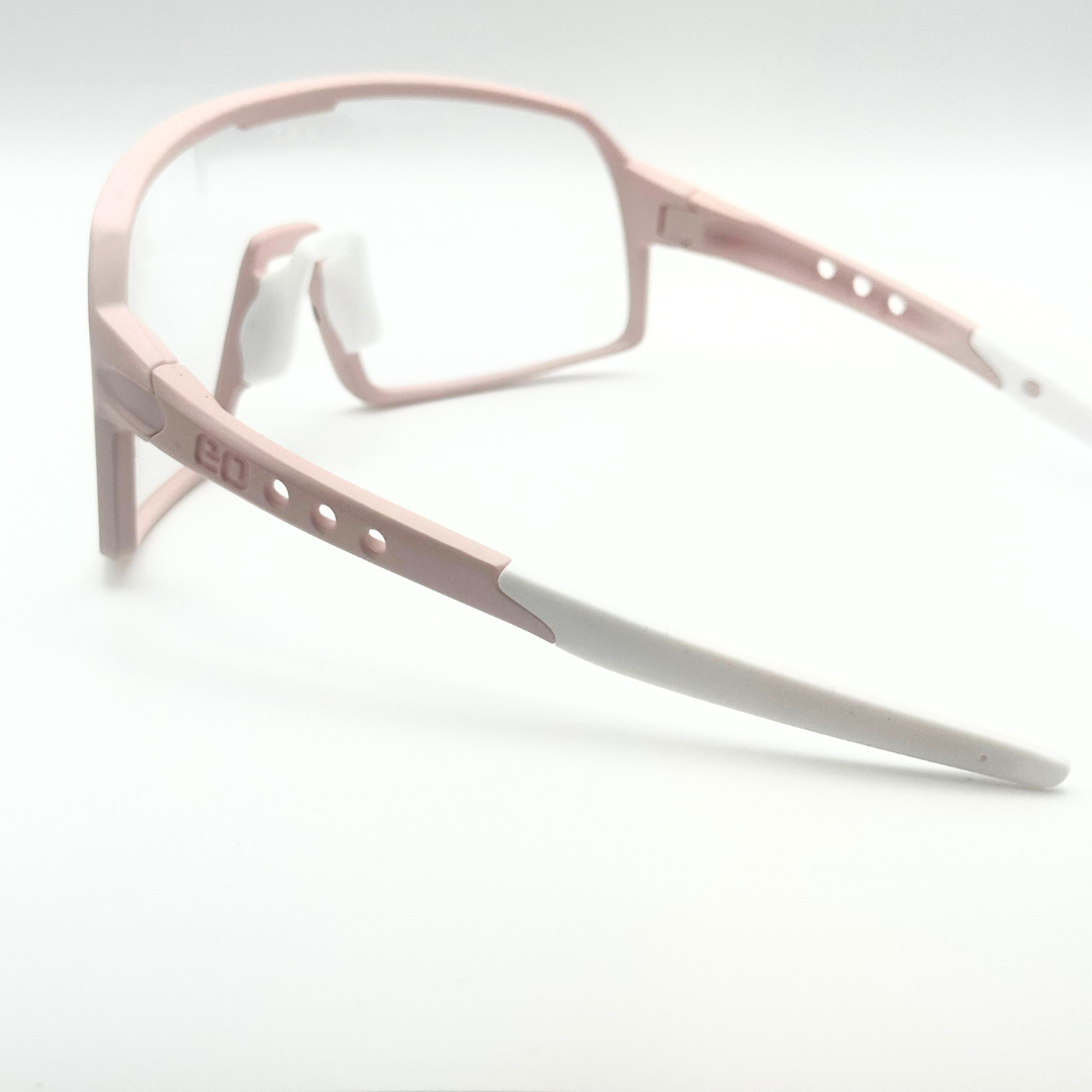 Eastern Outer Mojave sunglasses with photochromic lenses, rear angle view showing rose-colored frame and lens details.