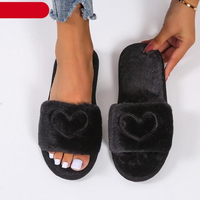 Stevvex women's warm faux fur slippers with heart-shaped design, open toe, memory foam insole, soft indoor floor slides.