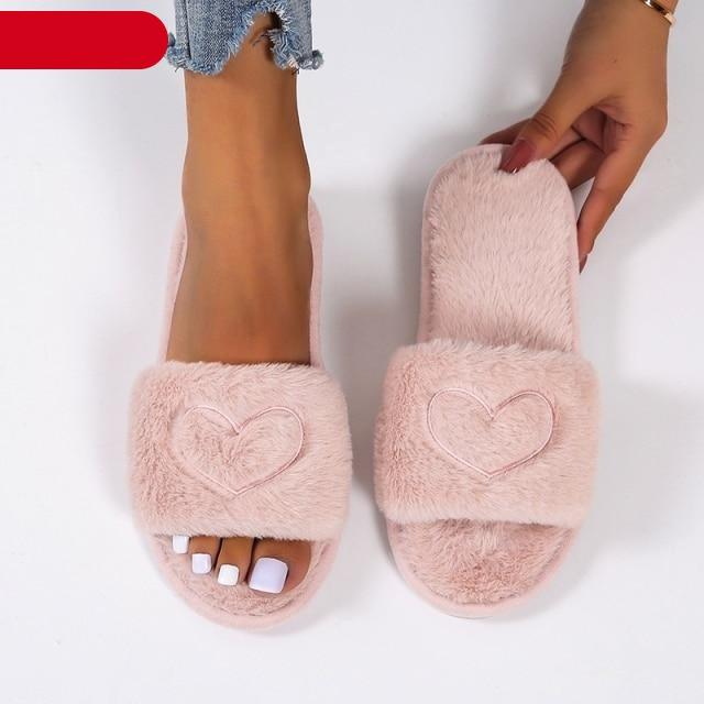 Stevvex women's faux fur indoor slippers with heart-shaped open-toe design, plush soft fur, memory foam, and flat cozy house shoes.