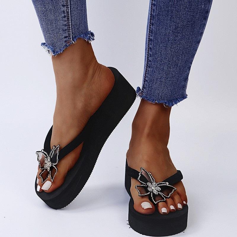 Women’s pink open-toe platform sandals by Stevvex featuring butterfly design, elegant style, and comfortable summer slip-ons.